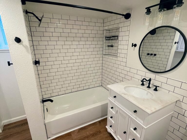 Improvements: custom tile shower, new bathtub and fixtures, vanity, trim, flooring, light fixture, paint