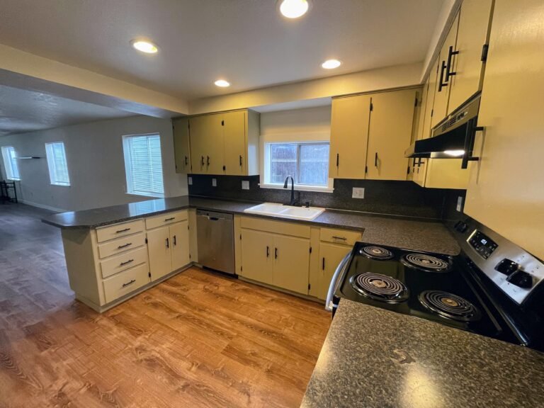 Improvements: cabinet paint, flooring, trim